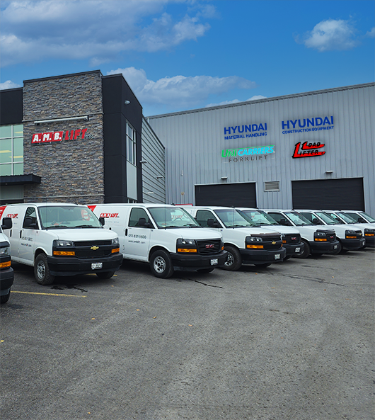 Line of service vans in front of the material handling facility in Ottawa
