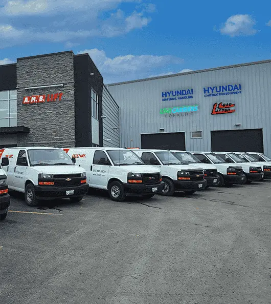 Line of service vans in front of the material handling facility in Ottawa